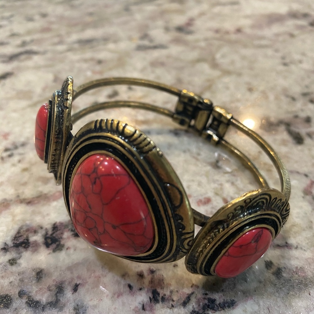 Gold and reddish pink bracelet